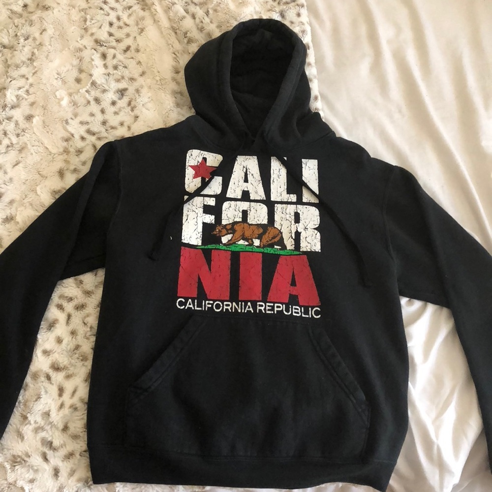 Two black California hoodies.